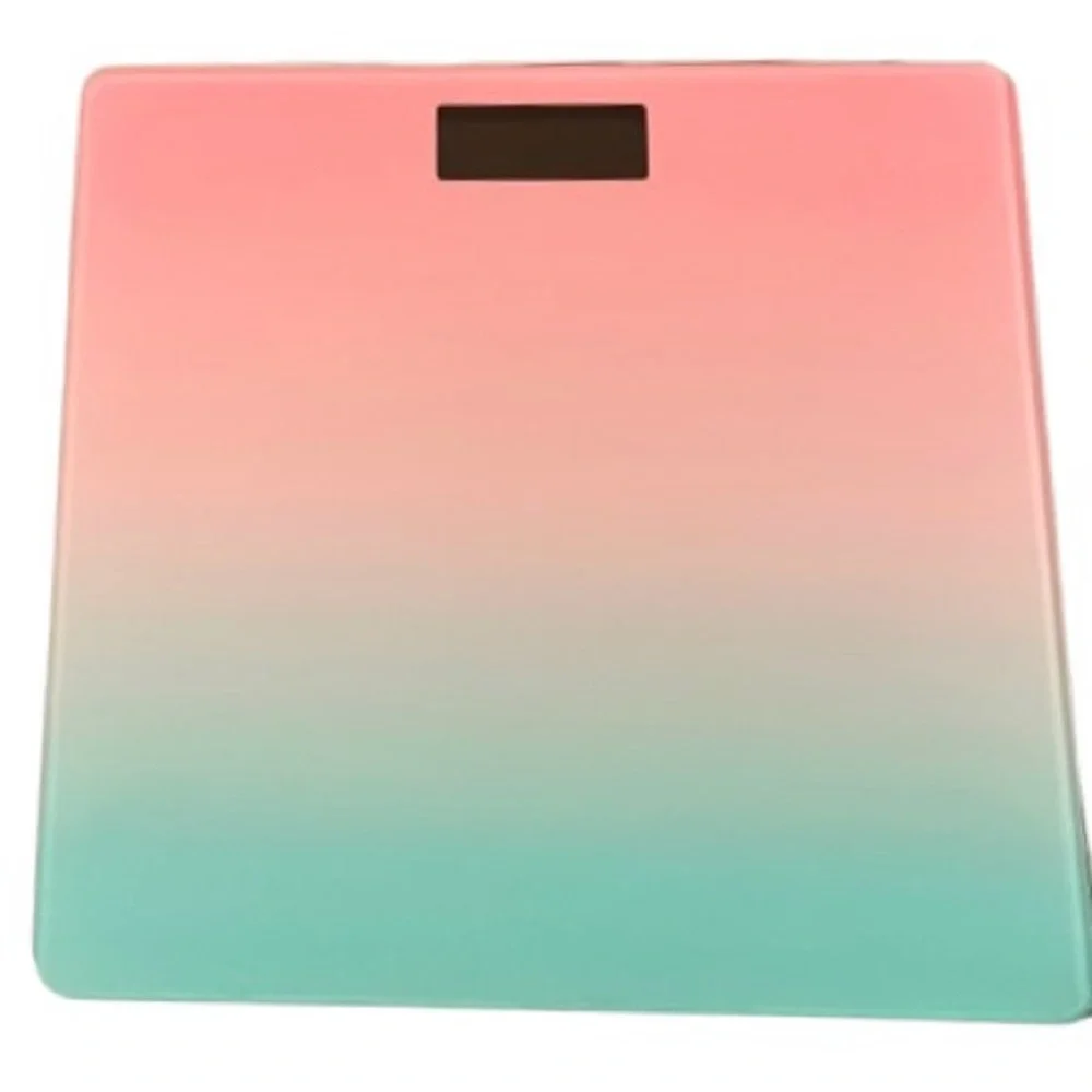🆕- Stylish digital scale with a pink and blue gradient design. New in Box.